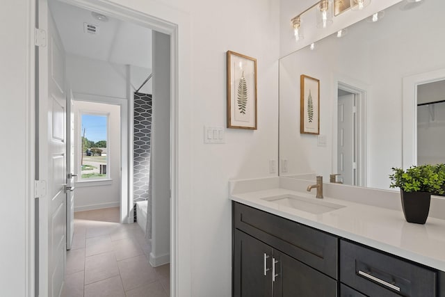 2105 Oak Haven Ct, Garland, TX 75044 - full bathroom featuring vanity and tile patterned flooring