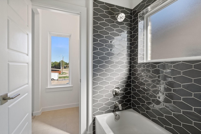 2105 Oak Haven Ct, Garland, TX 75044 - bathroom with bathing tub / shower combination and tile patterned flooring