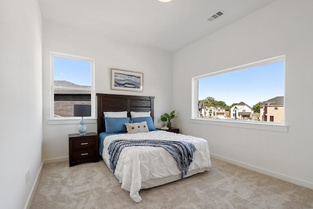 2105 Oak Haven Ct, Garland, TX 75044 - carpeted bedroom with multiple windows