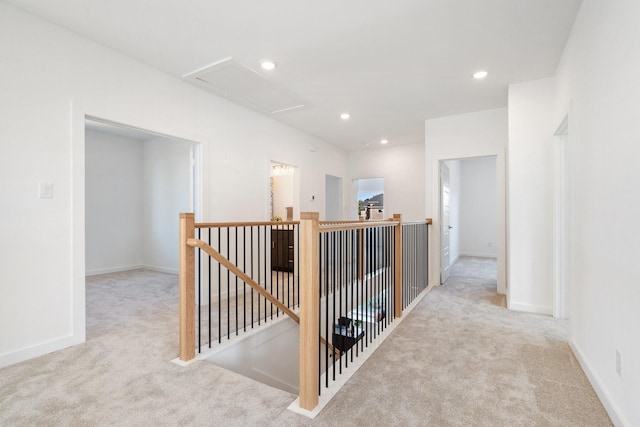 2105 Oak Haven Ct, Garland, TX 75044 - corridor featuring an upstairs landing, attic access, carpet flooring, and recessed lighting