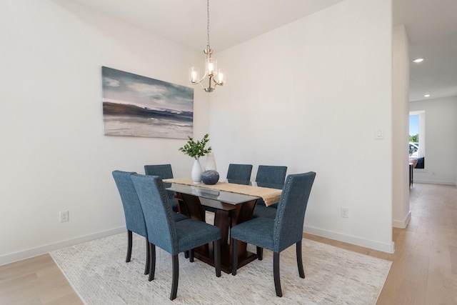 2105 Oak Haven Ct, Garland, TX 75044 - dining space featuring a chandelier, light wood-style floors, and recessed lighting