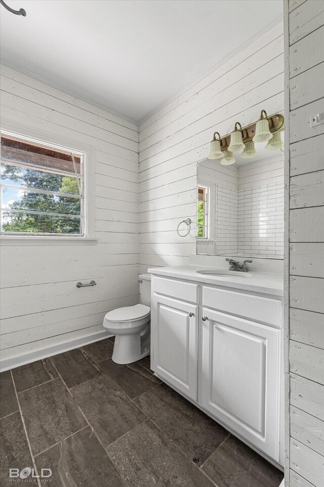 174 Carrollton Ave, Shreveport, LA 71105 - half bathroom with vanity and wood walls