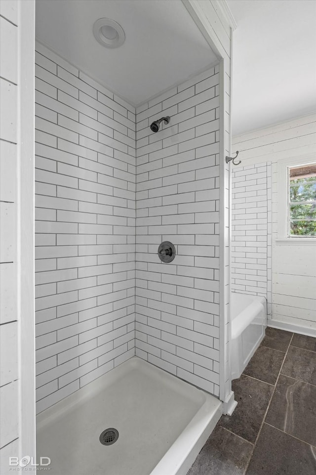 174 Carrollton Ave, Shreveport, LA 71105 - bathroom featuring tiled shower and tile patterned flooring