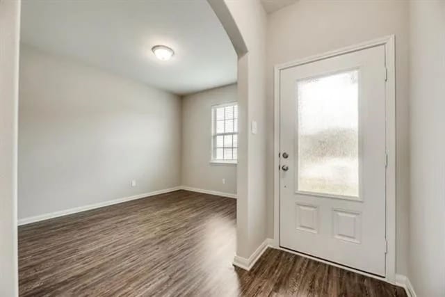 220 Aaron St, Anna, TX 75409 - entrance foyer featuring arched walkways and dark wood-style floors