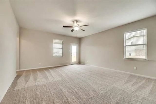 220 Aaron St, Anna, TX 75409 - empty room with a ceiling fan and light colored carpet