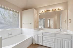 5729 Blackmon Ct, Fort Worth, TX 76137 - full bath with a bath and double vanity