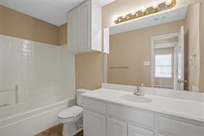 5729 Blackmon Ct, Fort Worth, TX 76137 - bathroom with vanity and bathing tub / shower combination