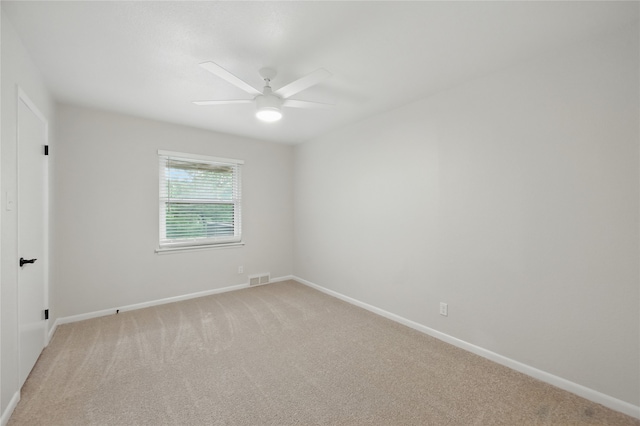 2705 Shelby St, Garland, TX 75041 - unfurnished room featuring a ceiling fan and light carpet