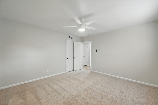 2705 Shelby St, Garland, TX 75041 - unfurnished bedroom with light carpet and ceiling fan