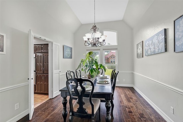 2900 Trail Lake Dr, Grapevine, TX 76051 - dining area featuring a chandelier, vaulted ceiling, and wood finished floors