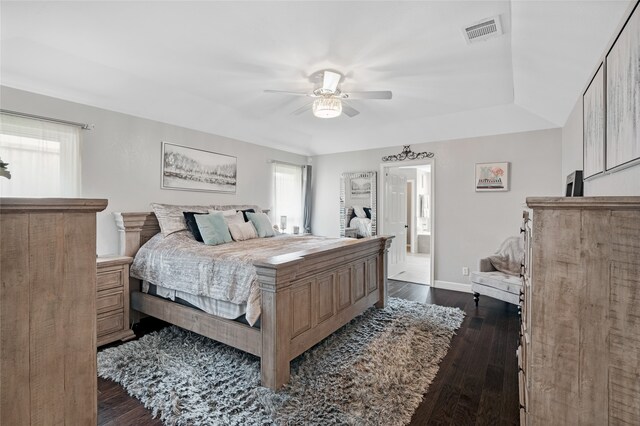 2900 Trail Lake Dr, Grapevine, TX 76051 - bedroom featuring dark wood-style flooring, ceiling fan, and connected bathroom