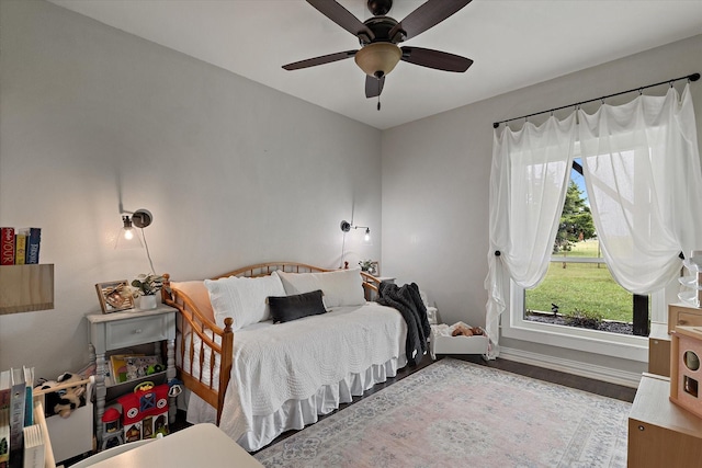 5885 State Highway 160, Whitewright, TX 75491 - bedroom with wood finished floors and ceiling fan