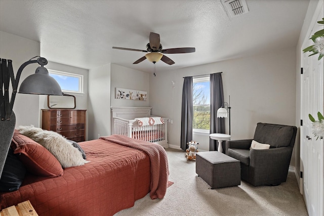 5885 State Highway 160, Whitewright, TX 75491 - carpeted bedroom with baseboards and a ceiling fan