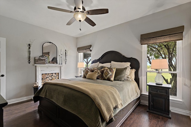 5885 State Highway 160, Whitewright, TX 75491 - bedroom with multiple windows, wood finished floors, and a ceiling fan