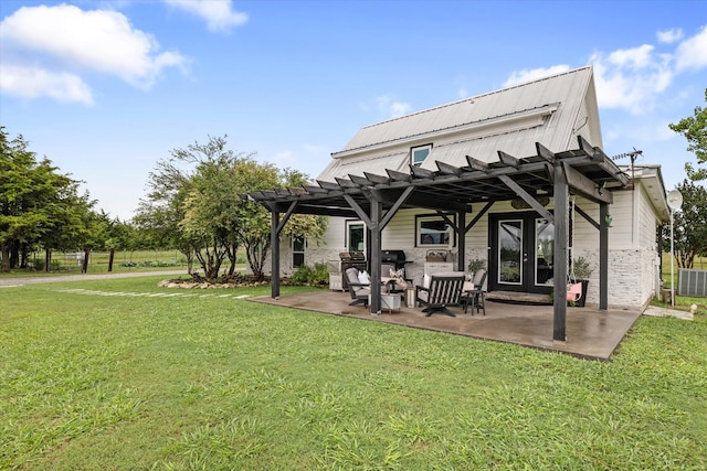 5885 State Highway 160, Whitewright, TX 75491 - back of house featuring a pergola, a yard, a patio area, and a metal roof