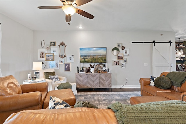 5885 State Highway 160, Whitewright, TX 75491 - living area featuring a barn door, wood finished floors, a ceiling fan, and recessed lighting