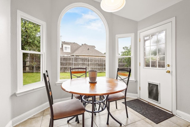 2009 Lake Fork Ct, Denton, TX 76210 - tiled dining space featuring baseboards
