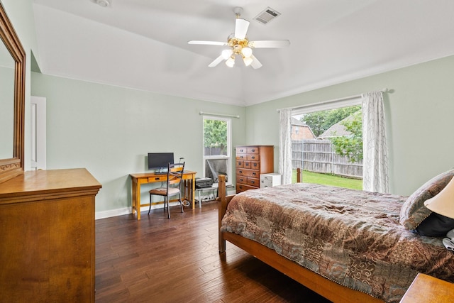 2009 Lake Fork Ct, Denton, TX 76210 - bedroom with dark wood-style flooring, vaulted ceiling, a ceiling fan, and an office area
