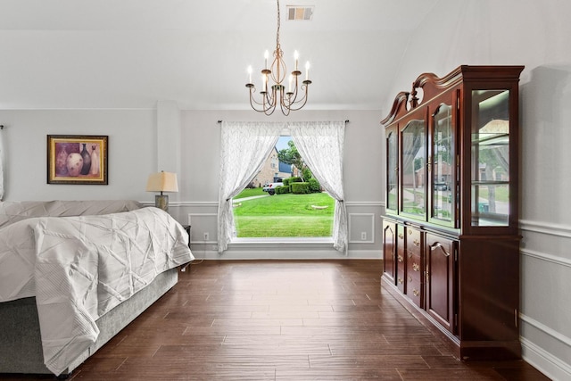 2009 Lake Fork Ct, Denton, TX 76210 - bedroom featuring a chandelier, vaulted ceiling, and dark wood-style flooring