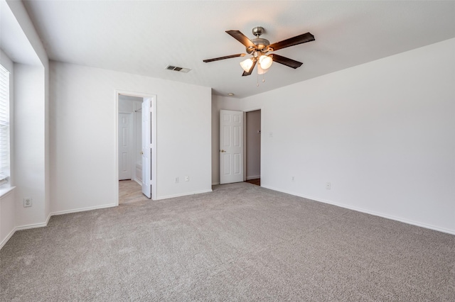 12430 Ridgetop Cir, Frisco, TX 75035 - unfurnished bedroom with light colored carpet and ceiling fan