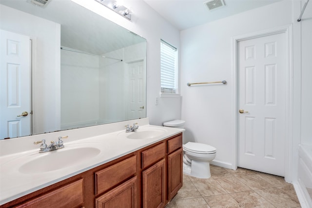 12430 Ridgetop Cir, Frisco, TX 75035 - bathroom with double vanity, a shower, and tile patterned floors