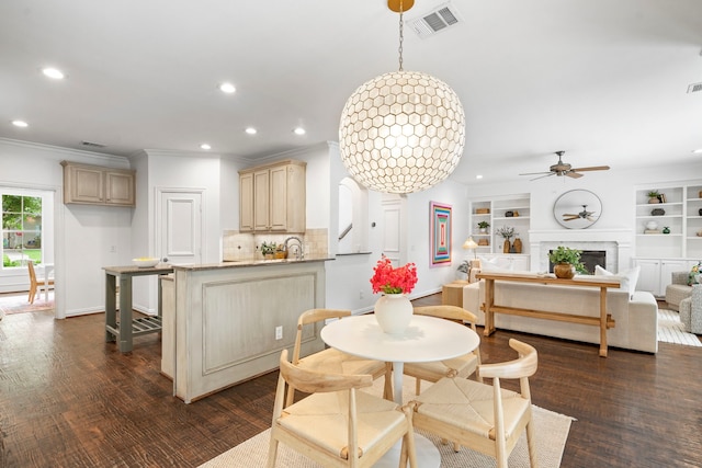 6154 Vickery Blvd, Dallas, TX 75214 - dining space with recessed lighting, ceiling fan, dark wood-type flooring, crown molding, and a fireplace