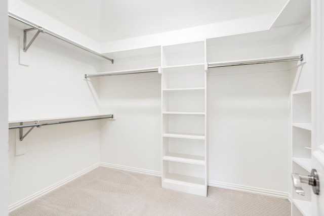 6154 Vickery Blvd, Dallas, TX 75214 - walk in closet with carpet flooring