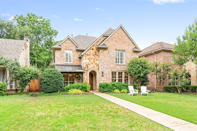 6154 Vickery Blvd, Dallas, TX 75214 - view of front of house featuring a front lawn and brick siding