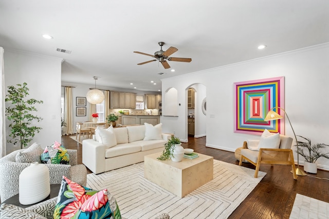6154 Vickery Blvd, Dallas, TX 75214 - living room with recessed lighting, arched walkways, ceiling fan, wood finished floors, and ornamental molding