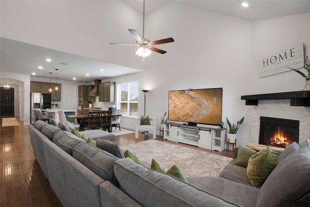 11504 Dawn Mist Dr, Frisco, TX 75035 - living room featuring recessed lighting, dark wood-type flooring, ceiling fan, and a fireplace