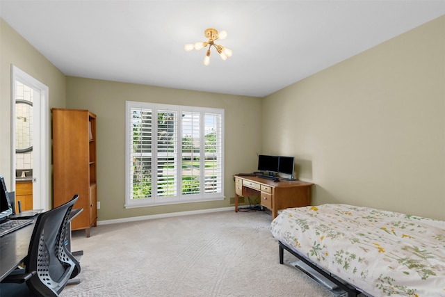 4247 Goodfellow Dr, Dallas, TX 75229 - bedroom with a chandelier, an office area, and light colored carpet