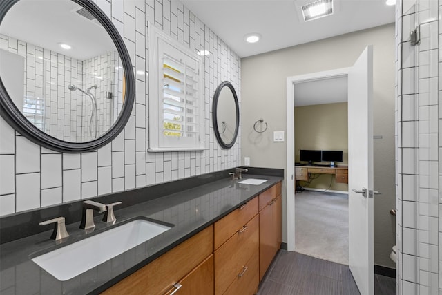 4247 Goodfellow Dr, Dallas, TX 75229 - full bathroom with double vanity and recessed lighting