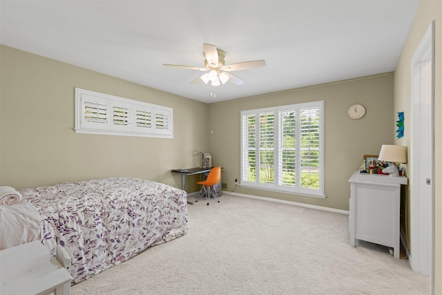 4247 Goodfellow Dr, Dallas, TX 75229 - carpeted bedroom with baseboards and ceiling fan
