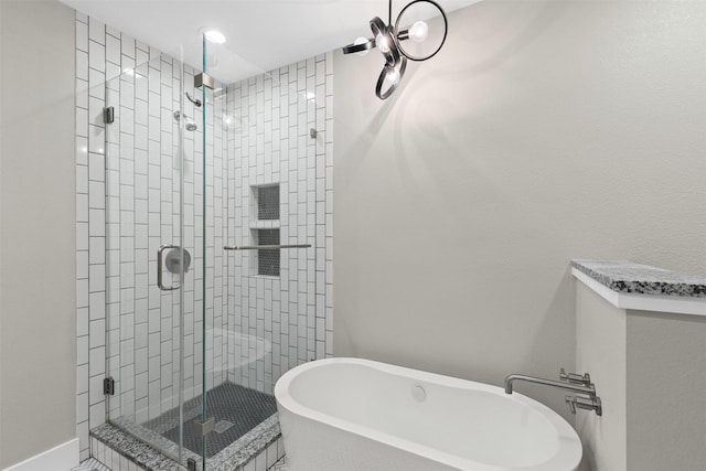4247 Goodfellow Dr, Dallas, TX 75229 - full bathroom with a shower stall and a freestanding bath