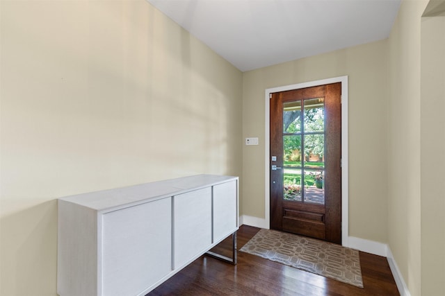4247 Goodfellow Dr, Dallas, TX 75229 - foyer featuring dark wood-style flooring and baseboards