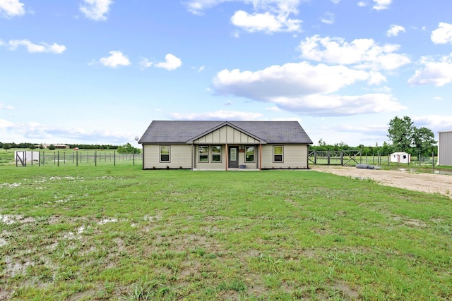 293 Private Road 36008, Honey Grove, TX 75446 - view of front of property featuring roof with shingles, driveway, and a storage shed