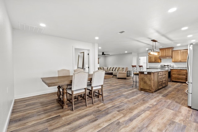 293 Private Road 36008, Honey Grove, TX 75446 - dining area with recessed lighting and wood finished floors