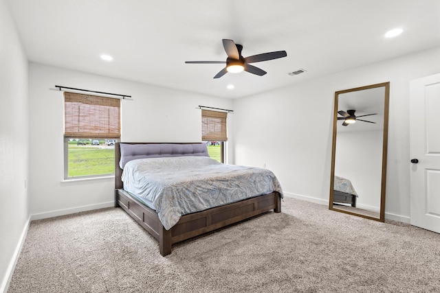 293 Private Road 36008, Honey Grove, TX 75446 - carpeted bedroom featuring multiple windows, recessed lighting, and a ceiling fan