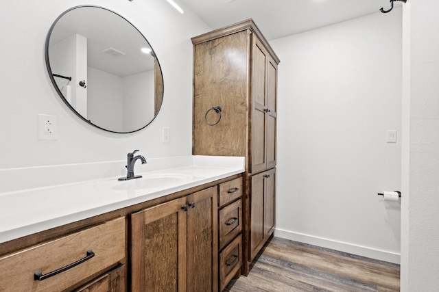 293 Private Road 36008, Honey Grove, TX 75446 - bathroom with vanity and wood finished floors