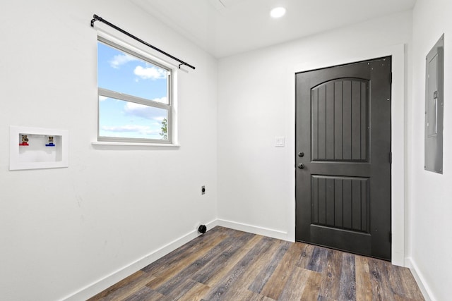 293 Private Road 36008, Honey Grove, TX 75446 - laundry area with dark wood-type flooring, hookup for a washing machine, electric dryer hookup, recessed lighting, and electric panel