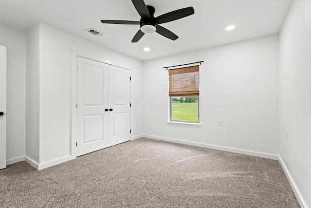 293 Private Road 36008, Honey Grove, TX 75446 - unfurnished bedroom with carpet flooring, recessed lighting, a closet, and a ceiling fan