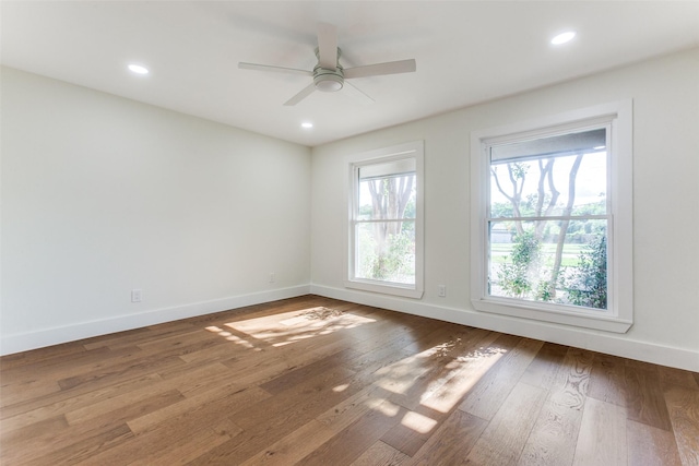 1508 N Waterview Dr, Richardson, TX 75080 - unfurnished room with a ceiling fan, wood finished floors, and recessed lighting
