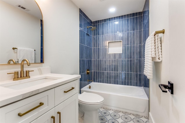 1508 N Waterview Dr, Richardson, TX 75080 - bathroom featuring vanity, tile patterned floors, and bathing tub / shower combination