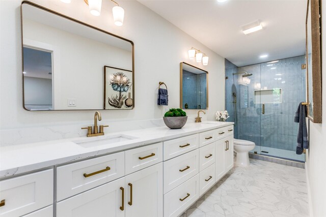 1508 N Waterview Dr, Richardson, TX 75080 - bathroom featuring marble finish floors, double vanity, and a shower stall