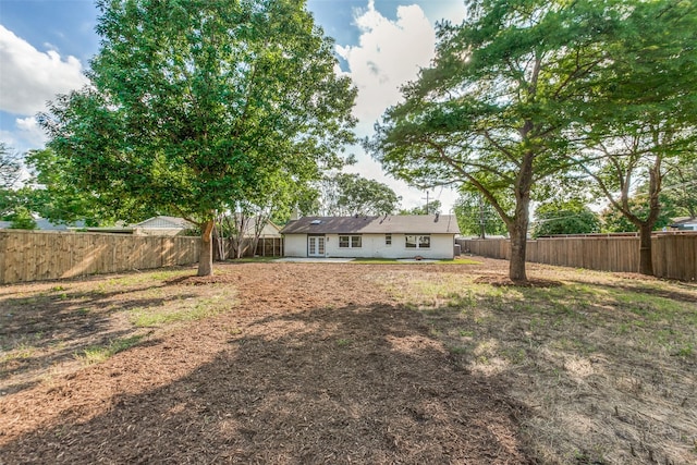 1508 N Waterview Dr, Richardson, TX 75080 - rear view of house featuring a fenced backyard