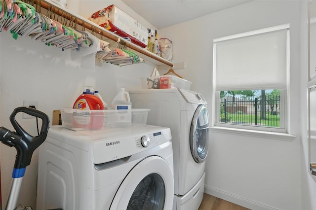 1801 Bent Brook Dr, Mesquite, TX 75181 - laundry area featuring independent washer and dryer and light wood-type flooring