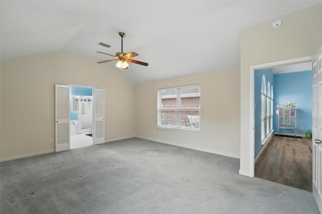 1801 Bent Brook Dr, Mesquite, TX 75181 - carpeted empty room with a ceiling fan, lofted ceiling, and a smoke detector