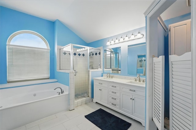 1801 Bent Brook Dr, Mesquite, TX 75181 - full bath with lofted ceiling, double vanity, a stall shower, a bath, and tile patterned flooring
