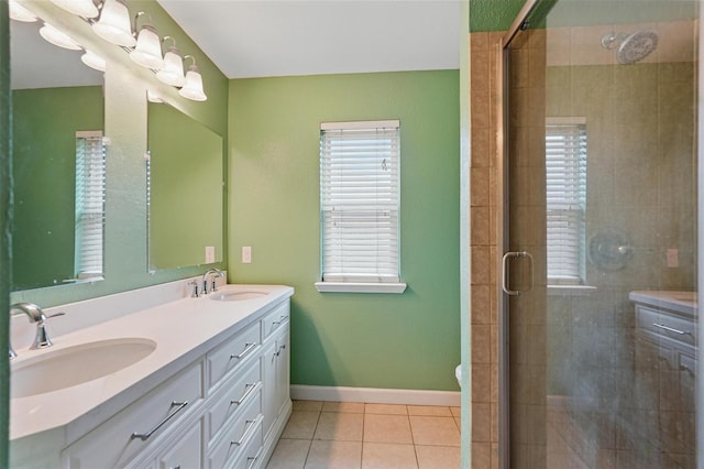 1801 Bent Brook Dr, Mesquite, TX 75181 - bathroom featuring double vanity, tile patterned flooring, and a stall shower