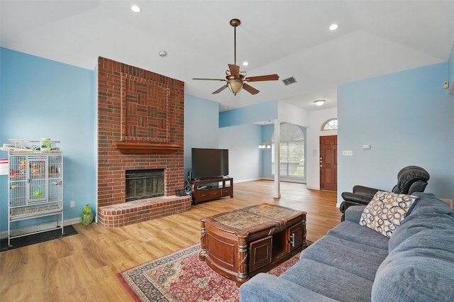 1801 Bent Brook Dr, Mesquite, TX 75181 - living area featuring wood finished floors, ceiling fan, a fireplace, recessed lighting, and lofted ceiling
